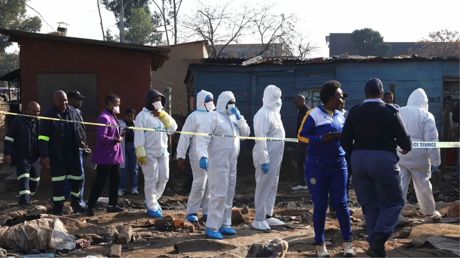 South Africa searches for shooters after 12 die in attack