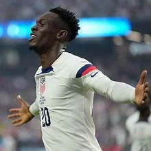Adams and Moffi Celebrate Balogun's World Cup Success