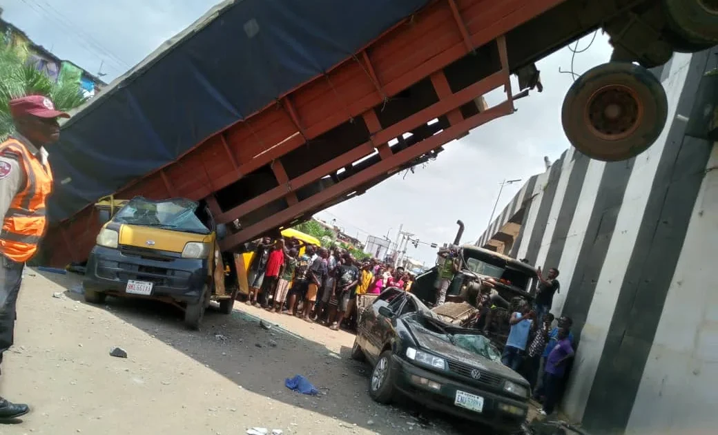 Two hurt as trailer falls from Anambra bridge and hits vehicles