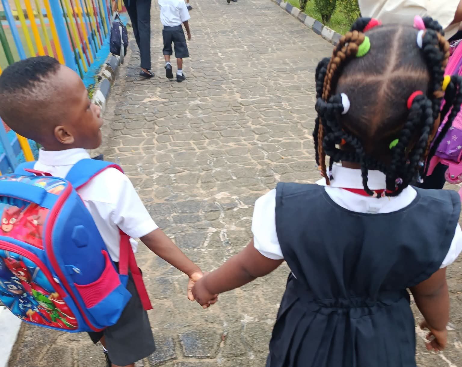 Sweet moment as toddler waits for friend before school