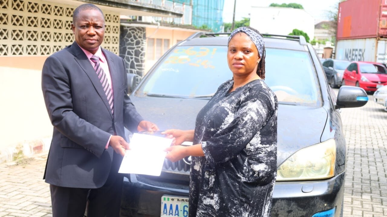 EFCC gives house, SUV, and other items to Australian scam victim