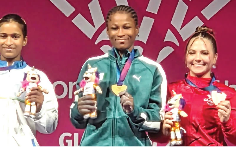 Didih remembers late mother after winning weightlifting gold