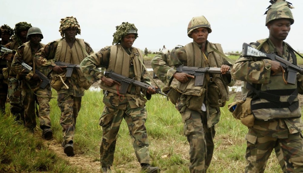 Nigerian soldiers find grave and retrieve body of community leader