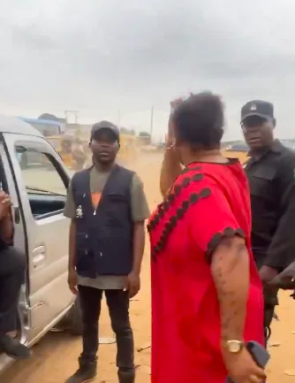 VIDEO: Woman stops police from taking boys after phone search in Lagos
