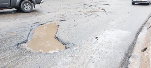 Residents worry as potholes and floods damage Edo roads