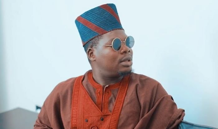Mr Macaroni explains why he has stopped criticizing the government