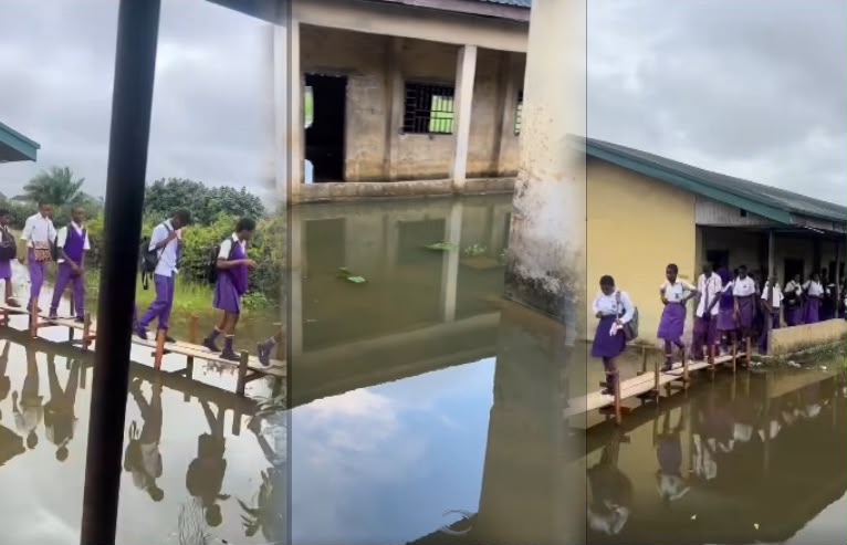 VIDEO: Rivers students brave floodwater on wooden planks to get to school