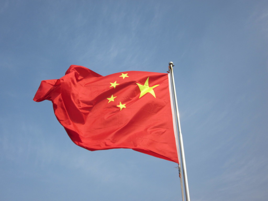 Iran warns neighbors over US sanctions as China stands firm