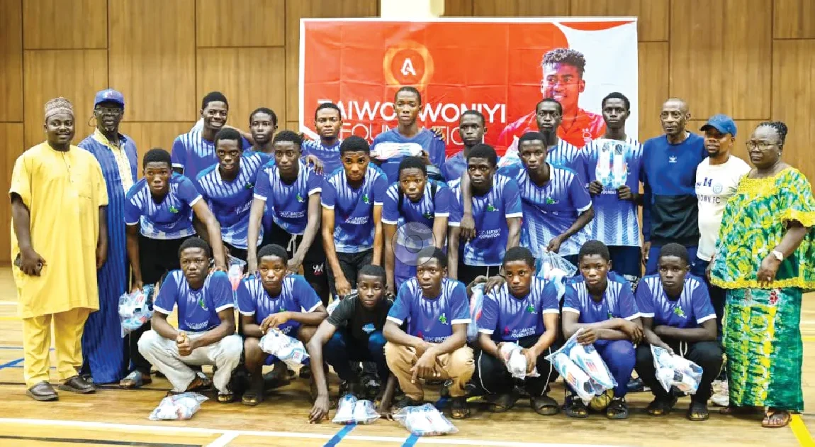 Taiwo Awoniyi gives football boots to 350 kids in Kwara